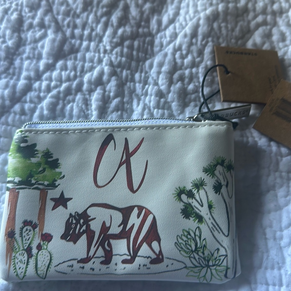 2 Starbucks money and card pouches as well as a key chain. Brand new with tags